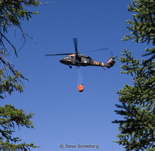 Helicopter getting water from Reservoir Lake